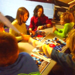 Line 'em up and sign 'em up! Million Hits signing for fans after their show at Spinning Wheels roller rink. Circa Halloween 2013. Line 'em up and sign 'em up! Million Hits signing for fans after their show at Spinning Wheels roller rink. Circa Halloween 2013.